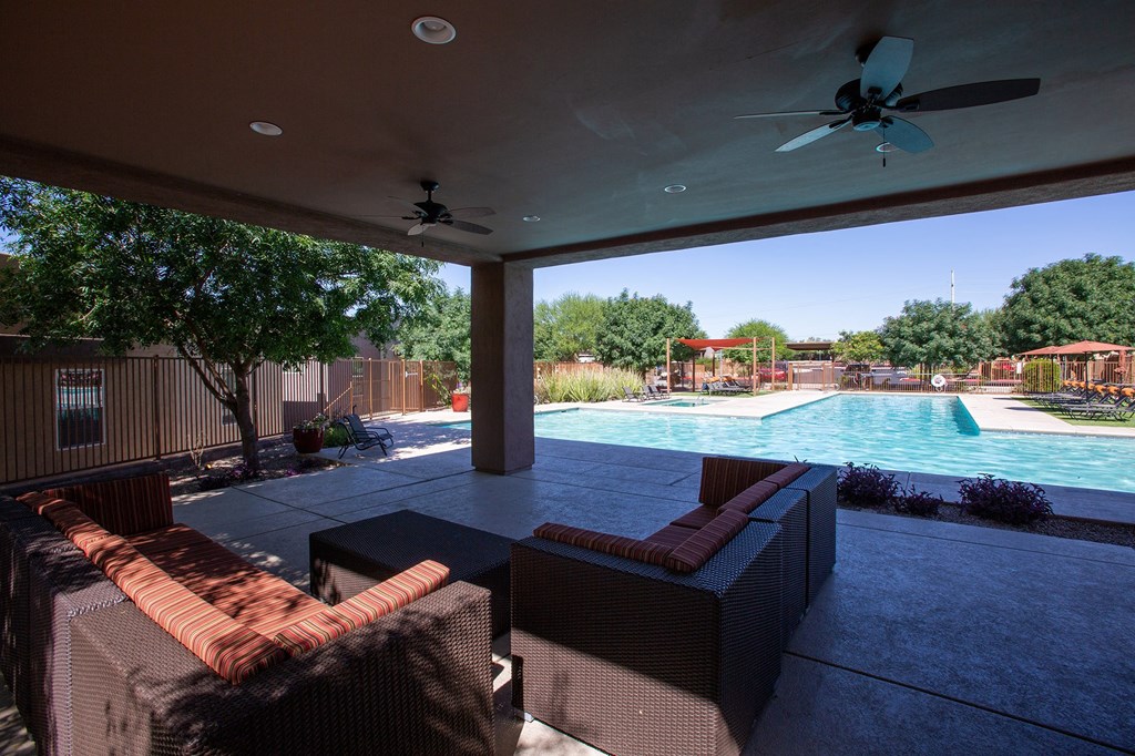 Pool lounge area at Sabino Vista Apartments in Tucson