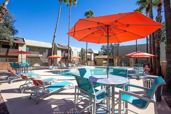 Pool lounge seating at River Oaks Apartments in Tucson - Photo Gallery 19