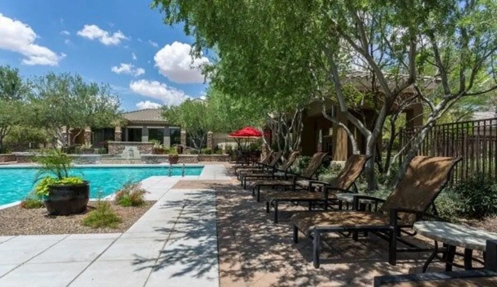 Pool with Shaded Lounge Area at Canyon Crossroads Apartment Homes in Phoenix AZ