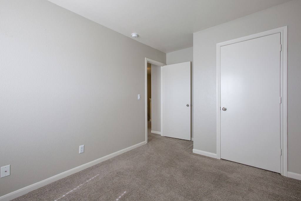 Second Bedroom at The Bluffs at Tierra Contenta Apartments