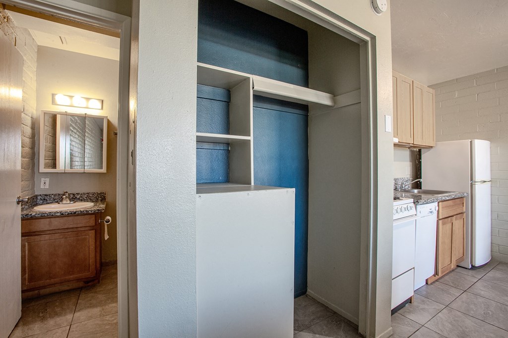 Studio Bathroom Vanity and Closet at University Manor Apartments in Tucson Arizona