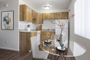 Studio Dining Area and Kitchen at Casa Del Coronado Apartments - Photo Gallery 3