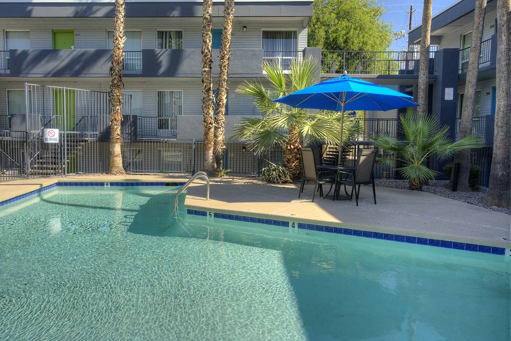 Table and pool at Radius Apartments in Phoenix AZ Nov 2020