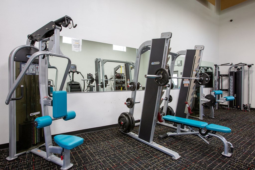 Weight Equipment at Whispering Sands Apartments in Albuquerque