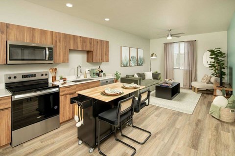 A modern kitchen with a wooden cabinet and a black stove top oven.