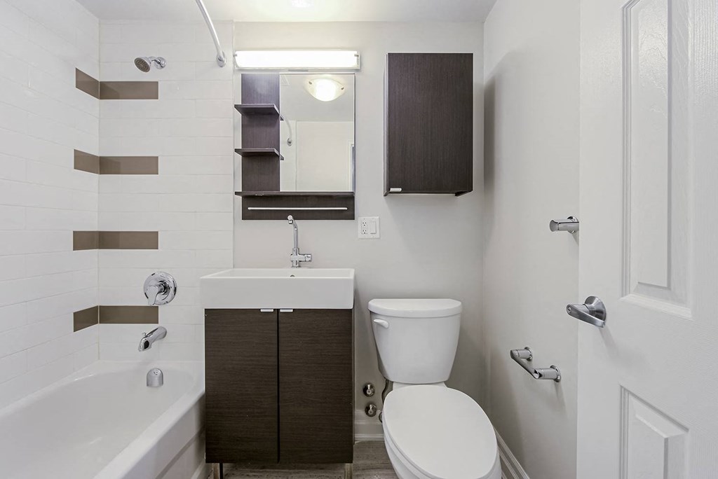 a bathroom with a toilet and a sink at 107 Redpath, Toronto, CA