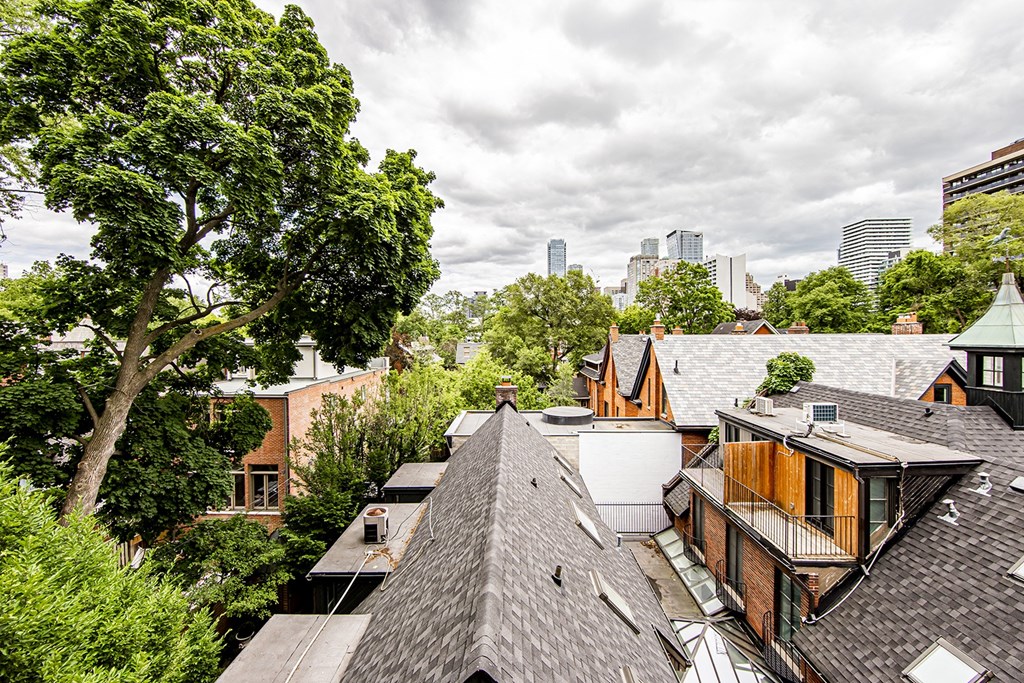 a view from the roof of a house with a city in the background at 161 St. George, Toronto, CA M5R 2M3