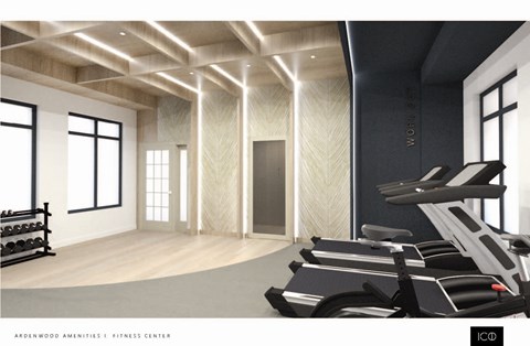 a gym with cardio machines and windows