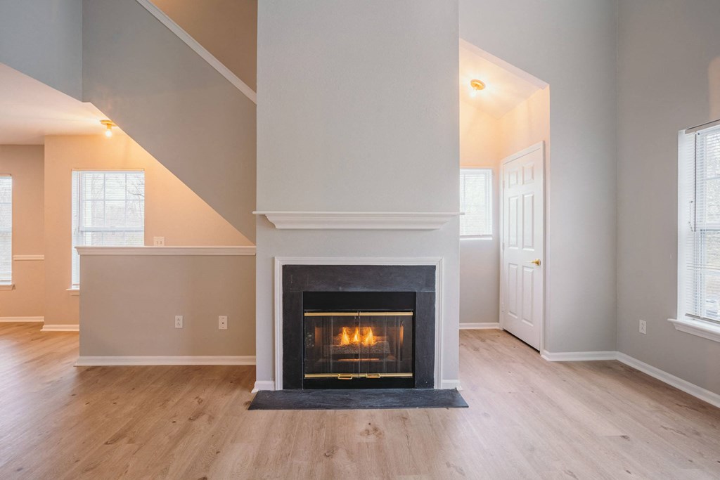 the living room of a house with a fireplace