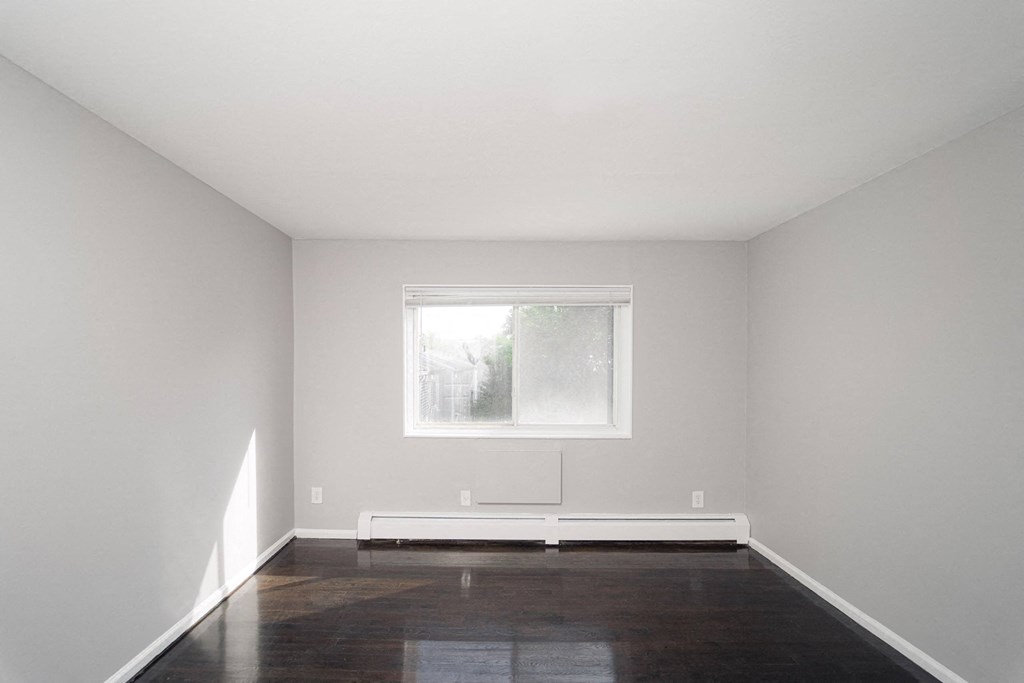 an empty room with white walls and a window at Encore 99, Connecticut, 06512