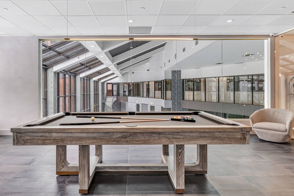 a billiards table in the lobby of an office building