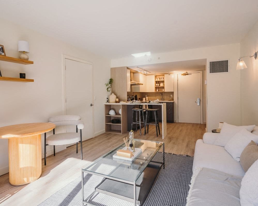 a living room with a couch and a table