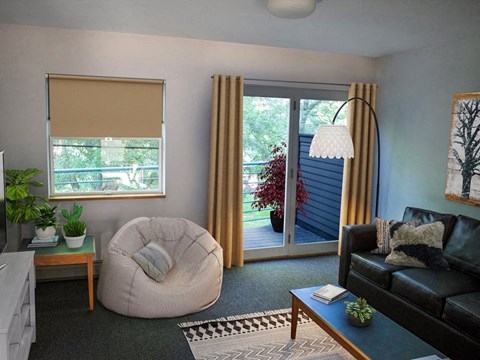 a living room with a couch and a chair and a sliding glass door