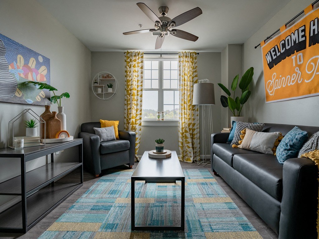 a living room with couches and a coffee table