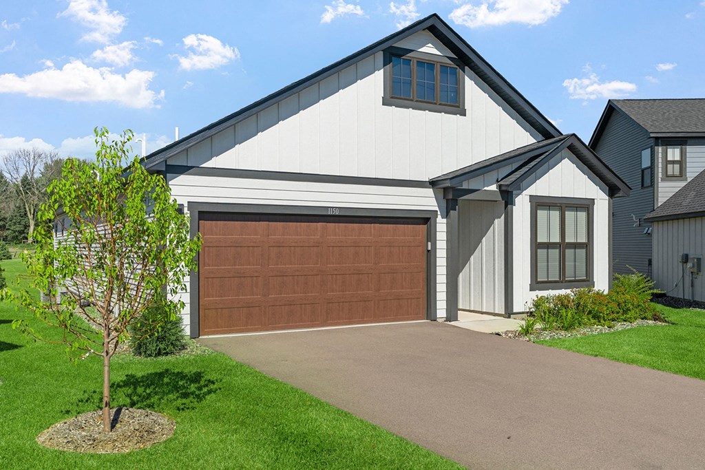 a garage door in front of a house
