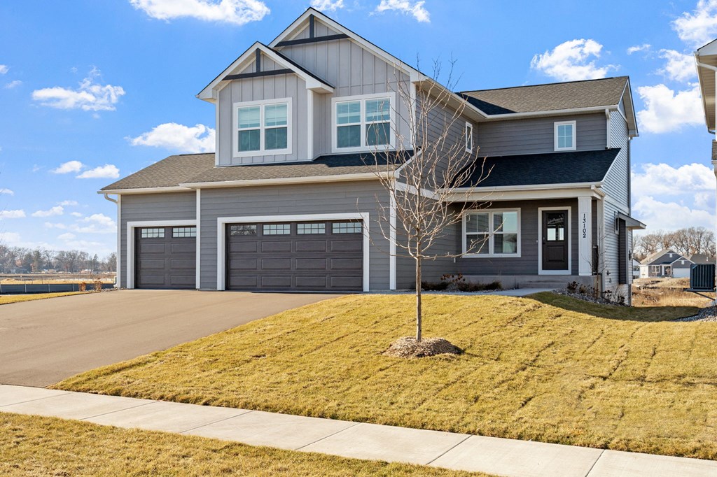 House with 3 car garage and yard