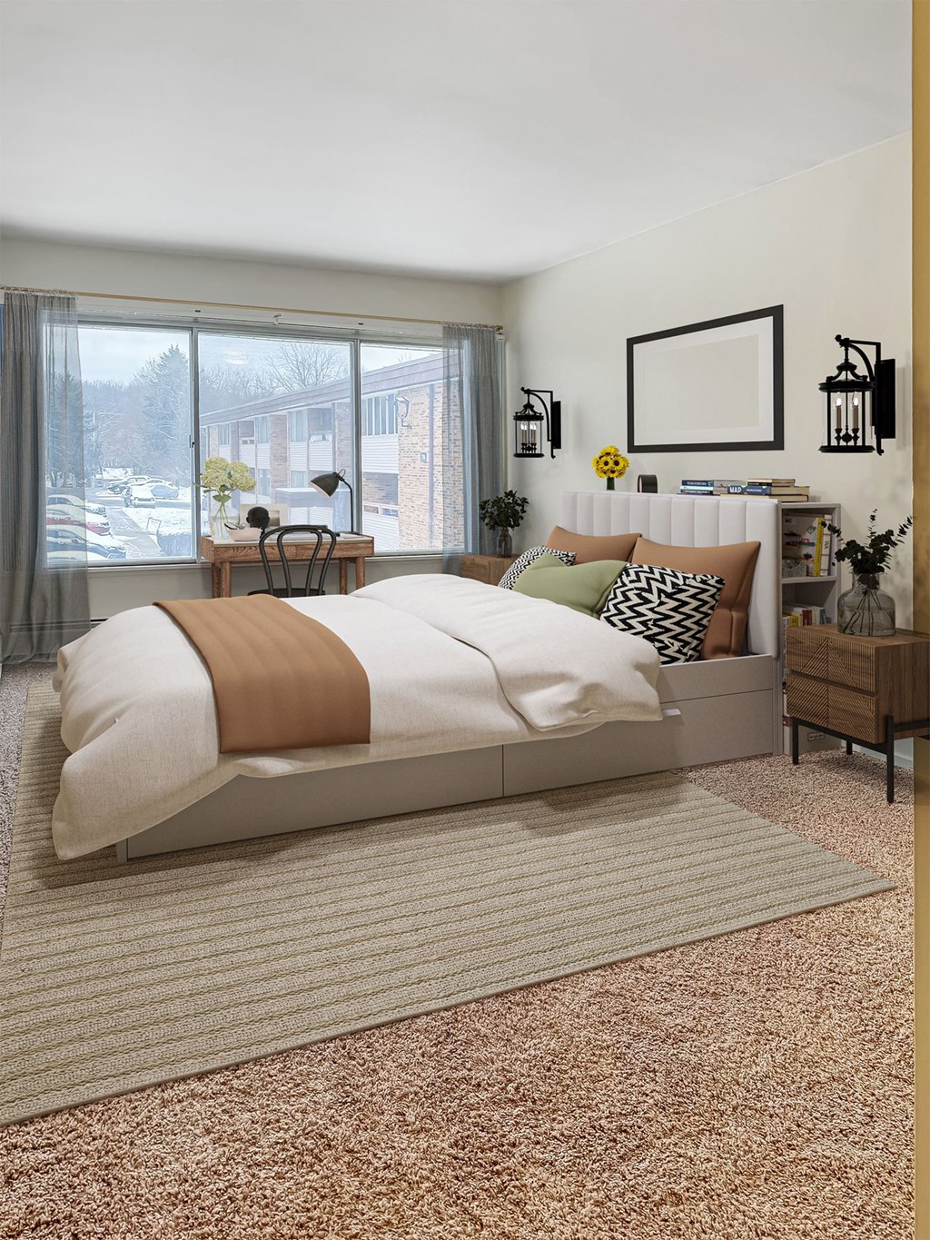 A bedroom with a large bed and a window overlooking a parking lot.