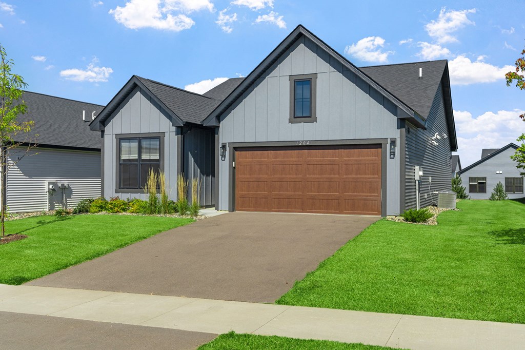 a garage door in front of a house