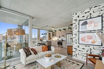 a living room with a couch and a table