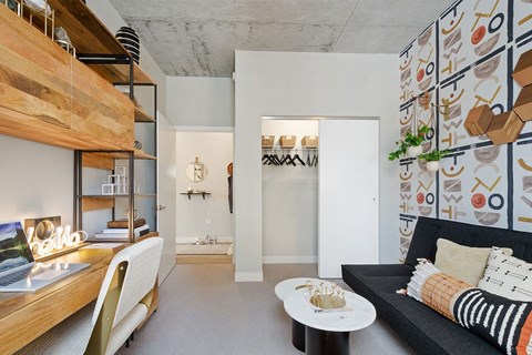 a living room with a couch and a table