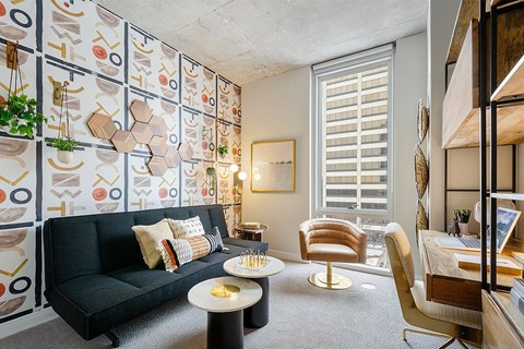 apartment office with desk and futon