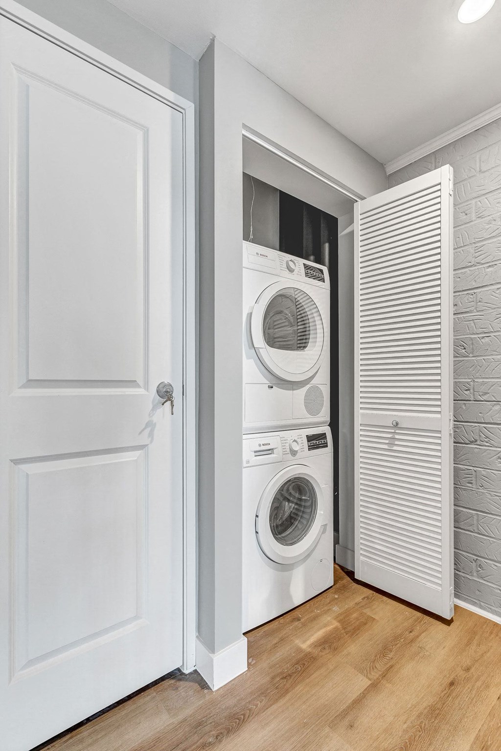 a small laundry room with a washer and dryer in a closet