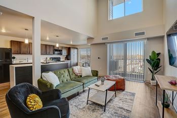 a living room with a couch and a table