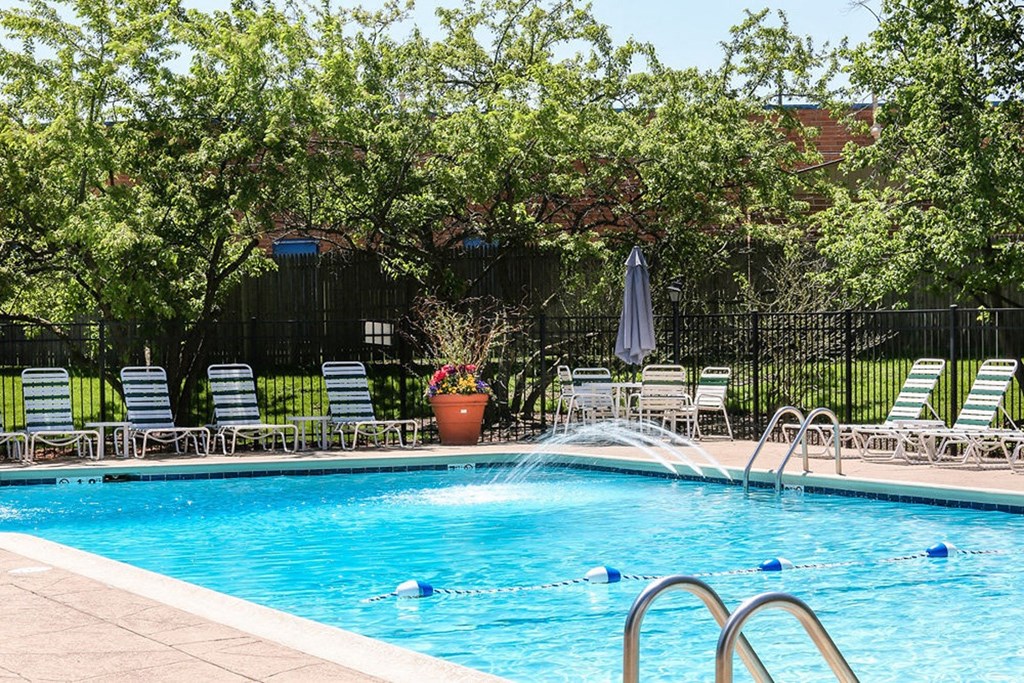 a swimming pool with water spraying out of it