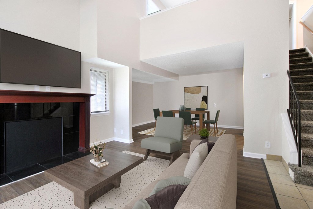 a living room with a couch and a tv