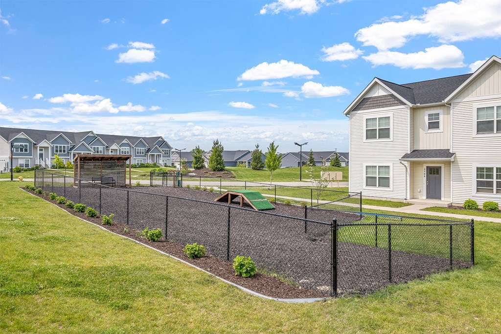 A residential area with houses and a playground.
