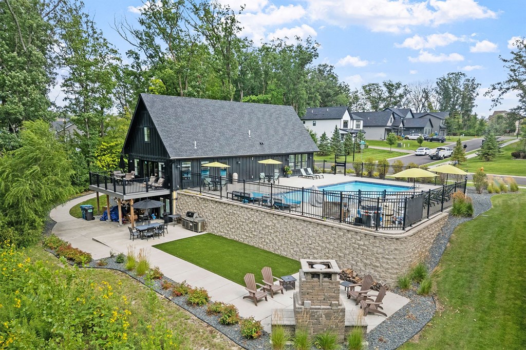 A house with a pool and a patio.