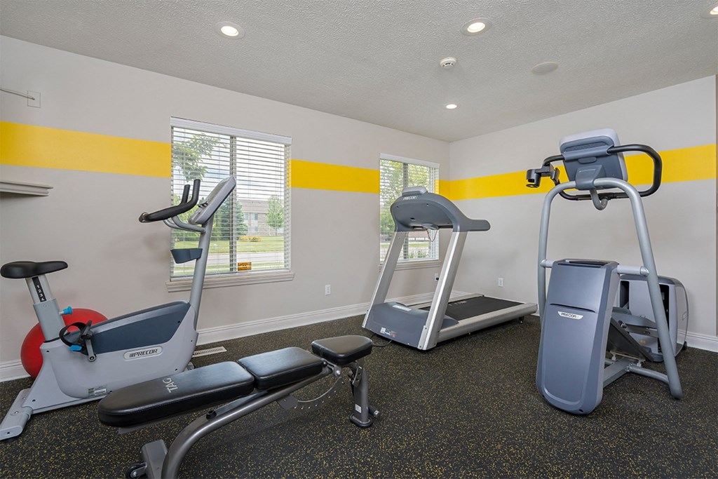 fitness center with treadmills