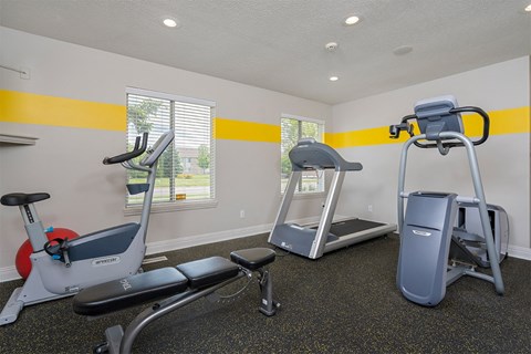 fitness center with treadmills