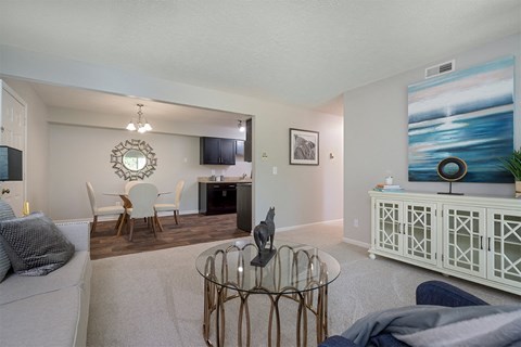 a living room with a couch and a table