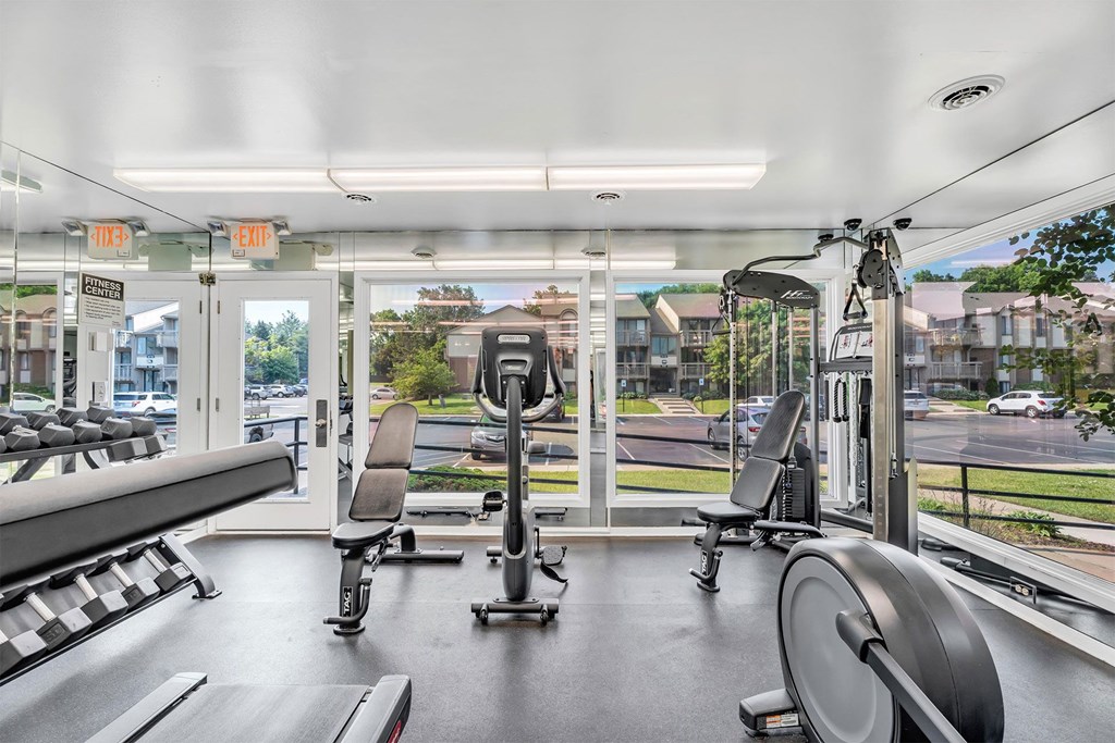 A gym with a view of the street outside.
