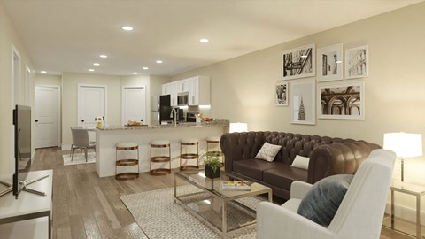 A modern living room with a brown leather couch and a television.