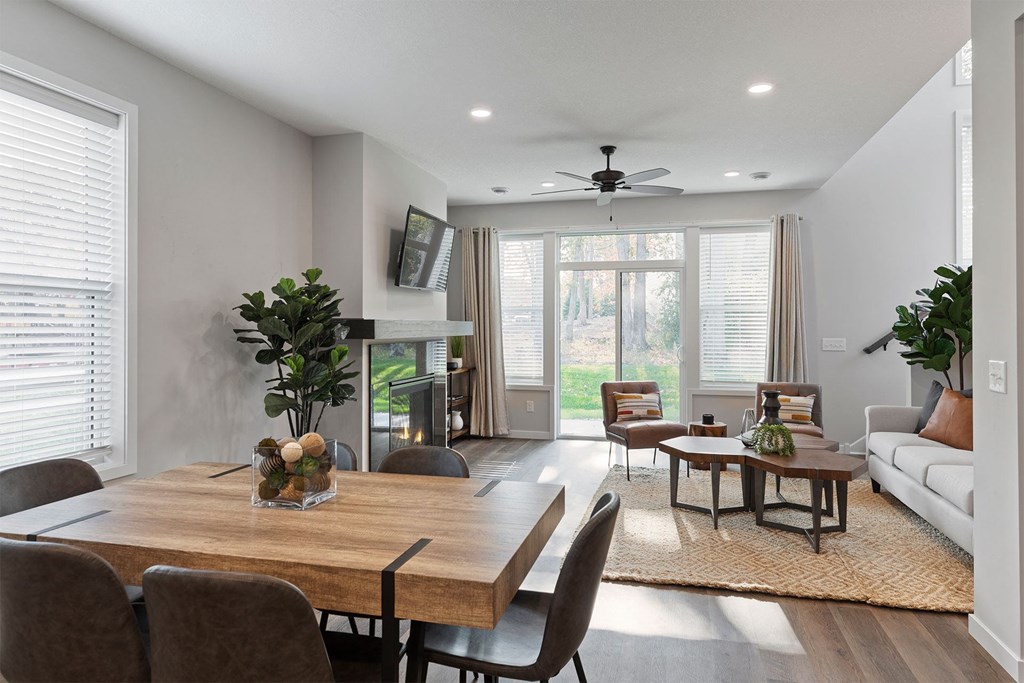 a living room with a couch and a table and a tv