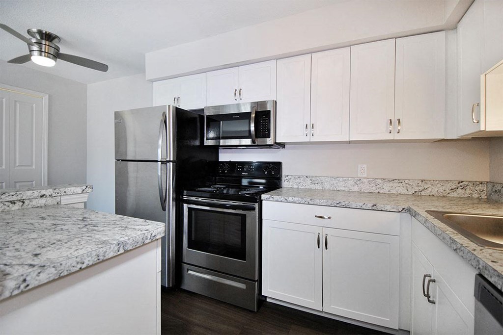 Bloomfield Place Apartments Kitchen with White Cabinets