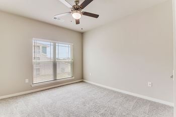 boterra at lago mar apartments ceiling fan with overhead light fixture in bedroom