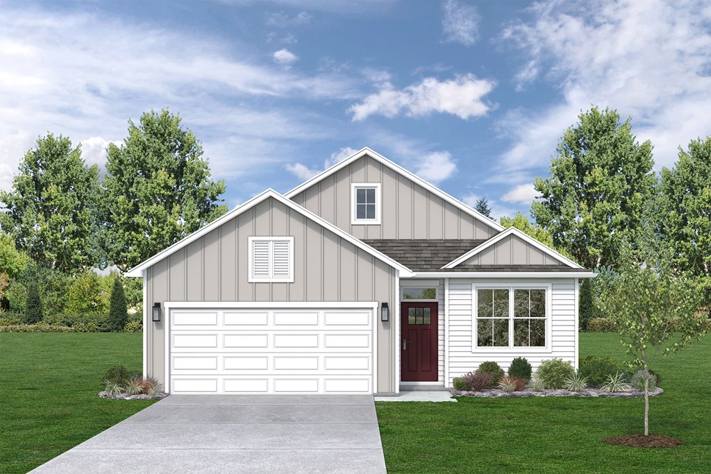 the exterior of a home with a white garage door
