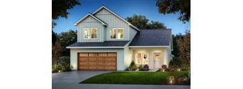 a home with a garage door in front of it