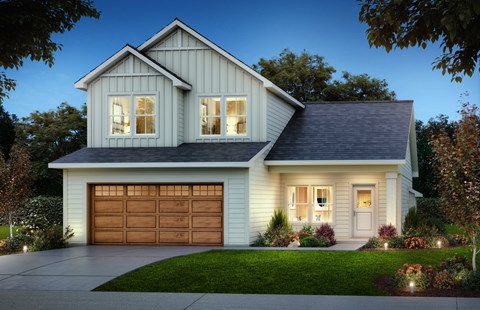 a home with a garage door in front of it