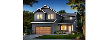 a home with a garage door in front of it