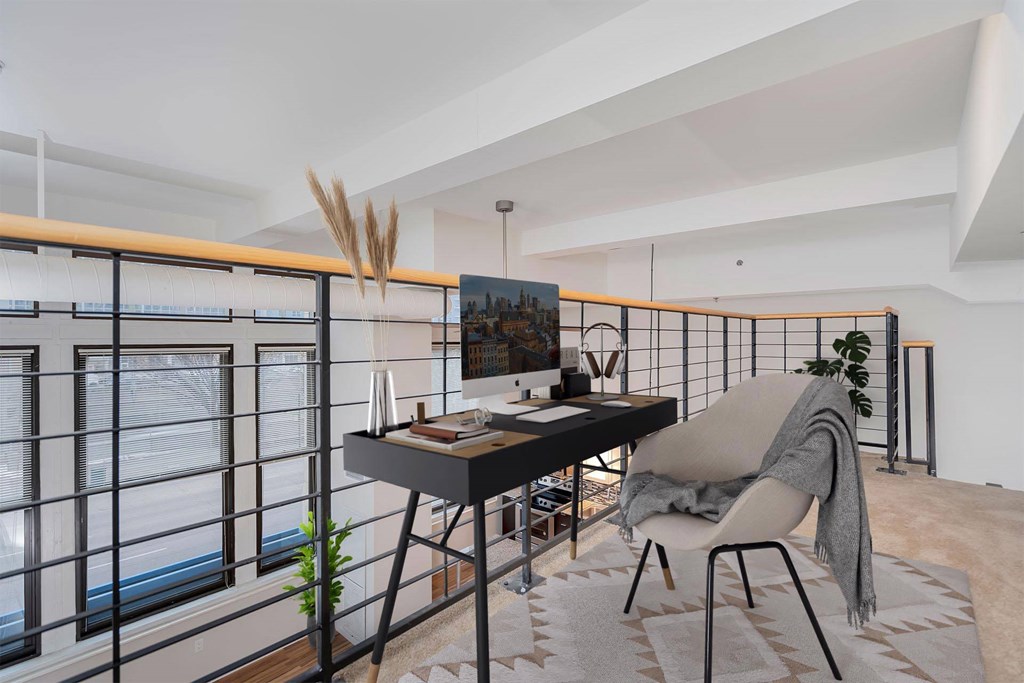 A modern living room with a balcony and a chair.