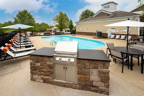 outdoor grilling station near the pool