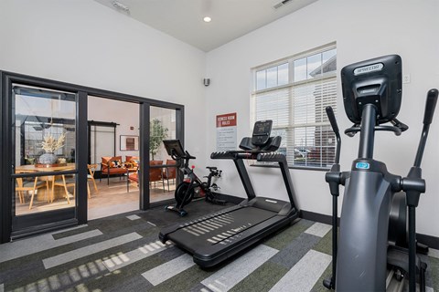 fitness center with treadmills