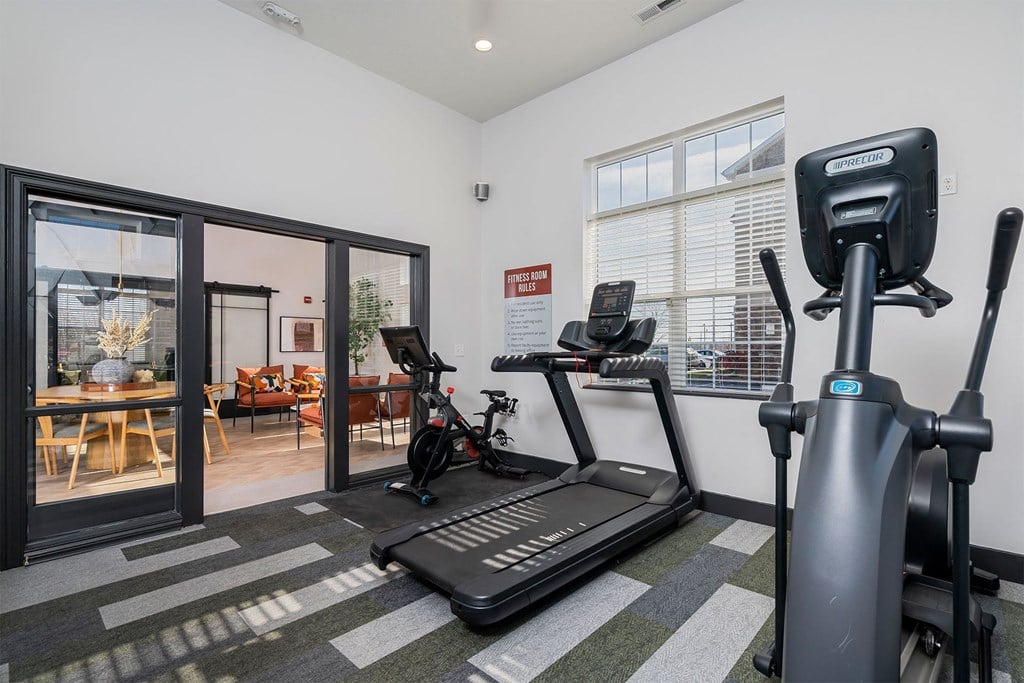 fitness center with treadmills