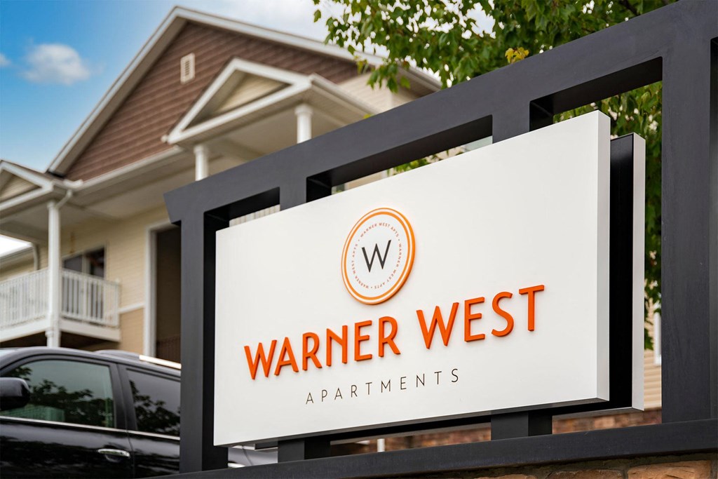 warner west apartments signage outside