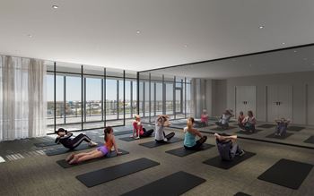 a rendering of a yoga studio with a view of the city