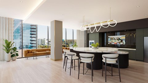 a kitchen and living room with a table and chairs